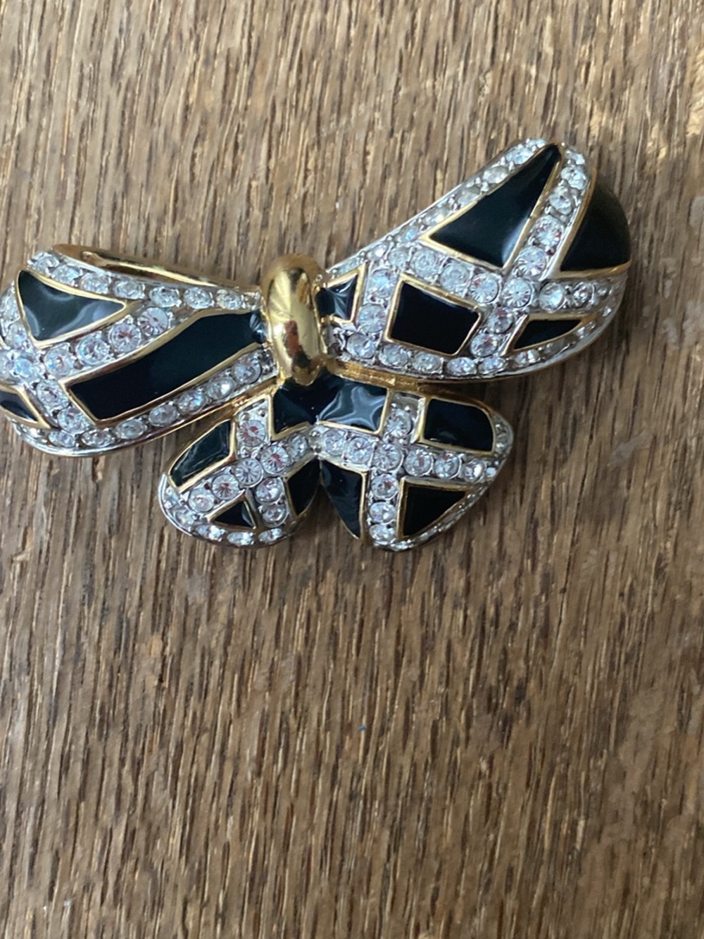 Gold-Tone Black Enamel Bow Brooch with Clear Crystals